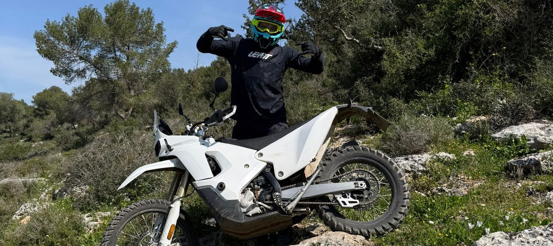 David with his KOVE 450 Rally on a rocky trail